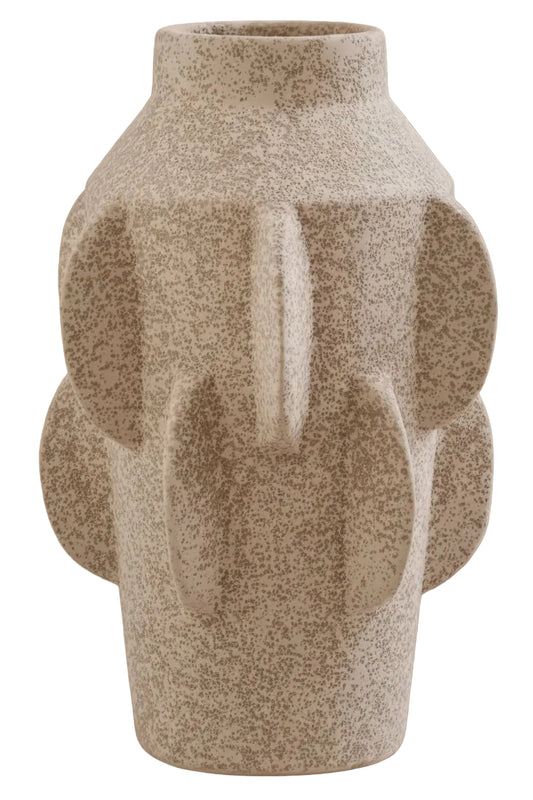 Textured vase on a beige background