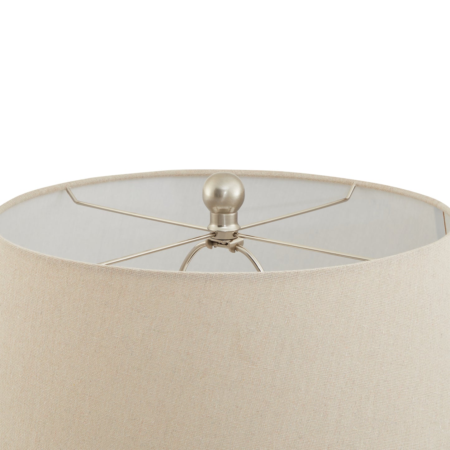 Close-up of a beige lampshade with a metallic fixture on a white background