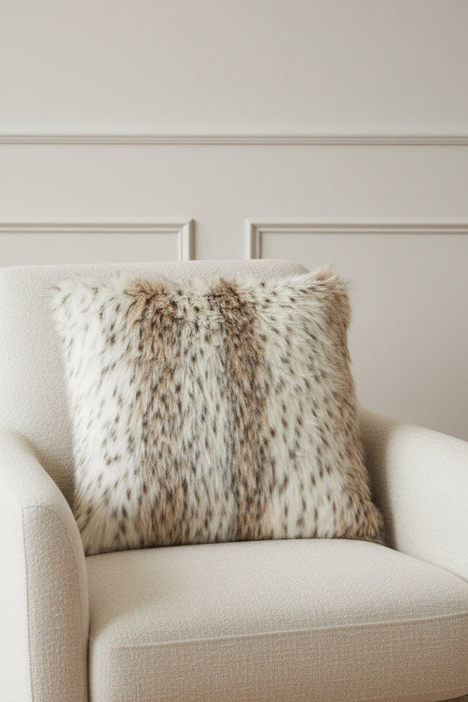 Faux fur pillow with a natural pattern on a white background