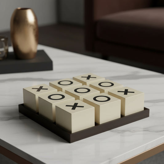 Set of tic-tac-toe game pieces with 'X' and 'O' symbols on beige cubes.