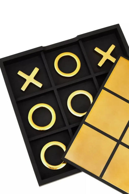 Black and gold tic-tac-toe game set on a white background