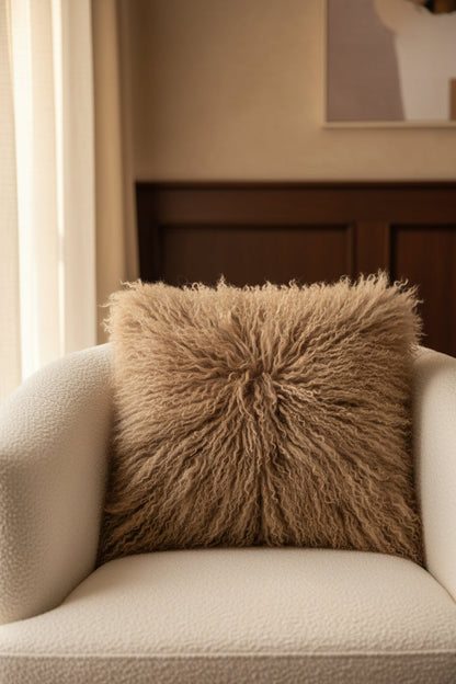 Brown fluffy pillow on a white background